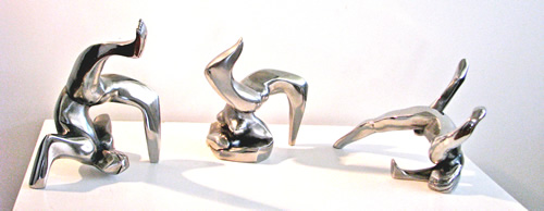 Small group sculptures of 3 breakdancers forming 'Graffitti Series (limited editions in glass, bronze, stainless steel)